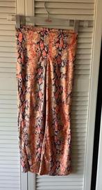 Nieuwe oranje slangenbroek maat 140 carnaval, Ophalen of Verzenden, Nieuw, 134 t/m 140, Jongen of Meisje