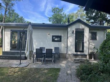 Te koop ruim chalet met vrije groene tuin op park Beekbergen beschikbaar voor biedingen