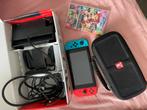 Nintendo Switch + Mario Kart 8 Deluxe + Case, Gebruikt, Racen en Vliegen, Eén computer, Ophalen of Verzenden