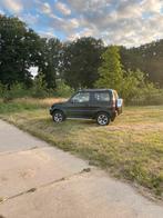 Suzuki Jimny 1.3 JLX 4WD AUTOMAAT 2002 Zwart, Auto's, Automaat, Stof, 40 €/maand, 4 cilinders