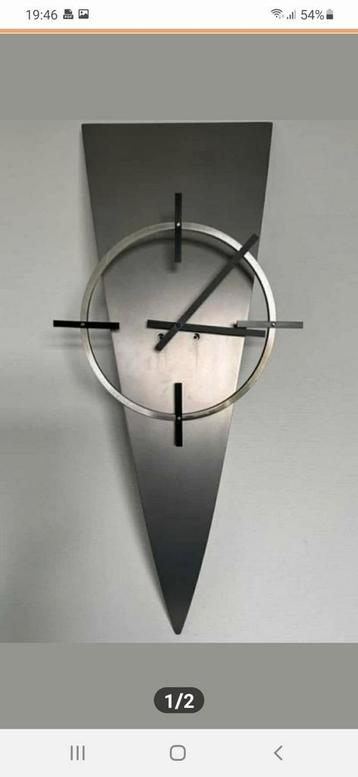 Zeer mooie zeldzame design klok van rvs. €100,-

 beschikbaar voor biedingen