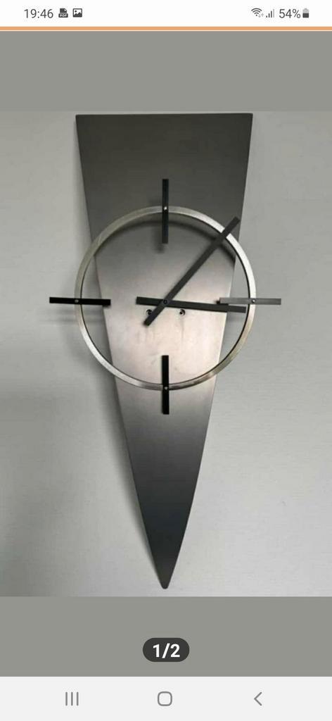 Zeer mooie zeldzame design klok van rvs. €100,-, Huis en Inrichting, Lampen | Wandlampen, Zo goed als nieuw, Metaal, Ophalen