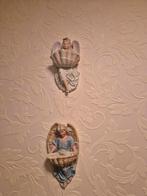 Twee engel wanddecoraties, Ophalen