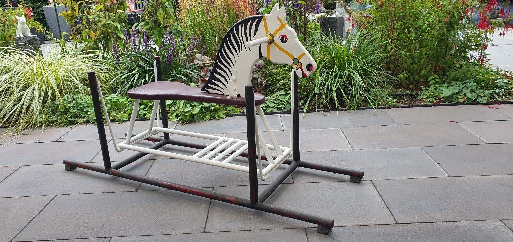 Soort hobbelpaard, Ophalen, Gebruikt