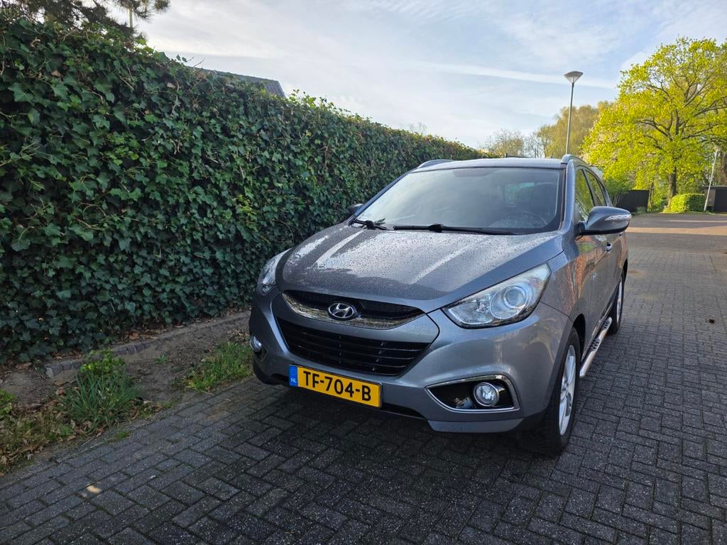 Hyundai iX35 1.6i GDI Blue 135pk 2013 Grijs, Voorwielaandrijving, 1280 kg, 4 cilinders, Leder en Stof