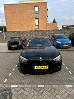 BMW 1-Serie 116i 136PK 5D Aut. 2014 Zwart, Auto's, BMW, 65 €/maand, 4 cilinders, Zwart, 1200 kg