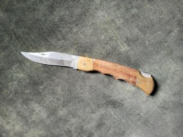 Mes dolk met hout en koperen lemmet handvat beschikbaar voor biedingen