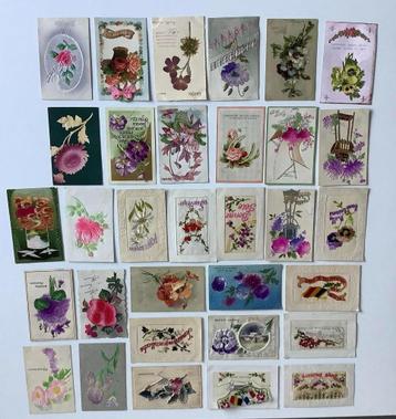 32 oude ansichtkaarten met bloemen in stof, geborduurd of in beschikbaar voor biedingen