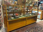 Toonbank / Vitrine, Ophalen