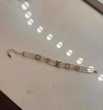 Logo armband goud - nieuw, Ophalen of Verzenden, Zo goed als nieuw, Goud, Met bedels of kralen