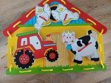 Houten rijgspel "boerderij" beschikbaar voor biedingen