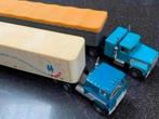 2 Ertl vrachtwagens kenworth en mack, Hobby en Vrije tijd, Modelauto's | Overige schalen, Ophalen of Verzenden, Zo goed als nieuw