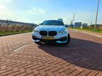 BMW 1-Serie 118i 140pk Aut 2020 Wit, Auto's, BMW, 65 €/maand, 4 cilinders, Wit, Leder