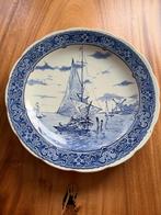 Delfts blauw bord, Ophalen