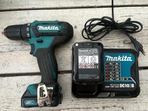 Makita DF333DZJ 12V Max Boor-/Schroefmachine + lader en accu, Doe-het-zelf en Verbouw, Gereedschap | Boormachines, Gebruikt, Boor- en Schroefmachine