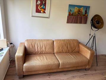Leren designbank – weinig gebruikt– ivm verhuizing beschikbaar voor biedingen