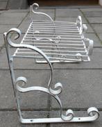 Brocante gietijzeren rek, Ophalen