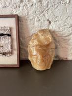 Stenen gezicht sculptuur, Verzenden