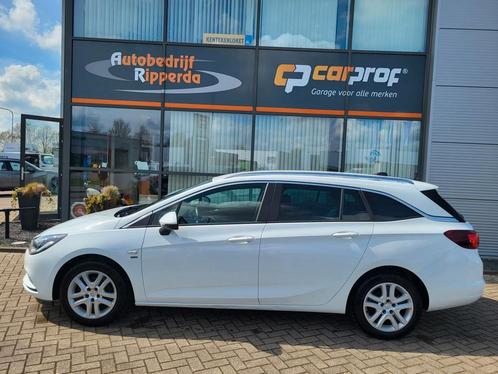 Opel Astra Sports Tourer 1.0 Turbo 120 Jaar Edition, Auto's, Opel, Bedrijf, Te koop, Astra, ABS, Achteruitrijcamera, Airbags, Airconditioning