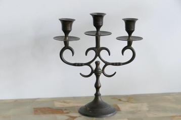 kaarsenstandaard metaal  beschikbaar voor biedingen