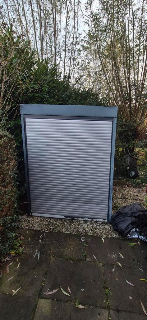 Fietsenstalling/Scootmobielberging met Rolluik - Gratis!, Tuin en Terras, Bergingen en Tuinkasten, Gebruikt, Fietsenberging, Metaal