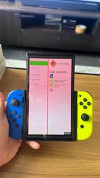 Nintendo Switch OLED met 40+ games & Flip Grip voor DS mode, Ophalen of Verzenden, Zo goed als nieuw, Met 1 controller, Switch OLED