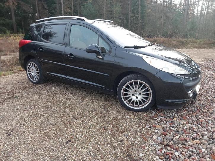 Peugeot 207 1.6 16V SW Outdoor 2008 Zwart, Auto's, Peugeot, Particulier, Airbags, Airconditioning, Cruise Control, Dakrails, Elektrische buitenspiegels