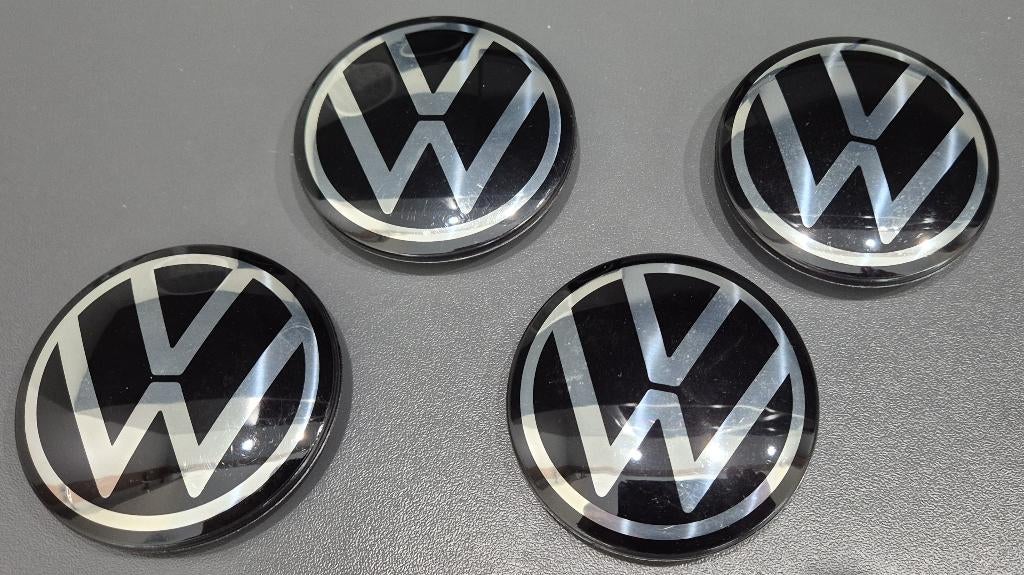 Originele VW naafkappen met nieuw logo, Auto diversen, Wieldoppen, Ophalen of Verzenden, Zo goed als nieuw