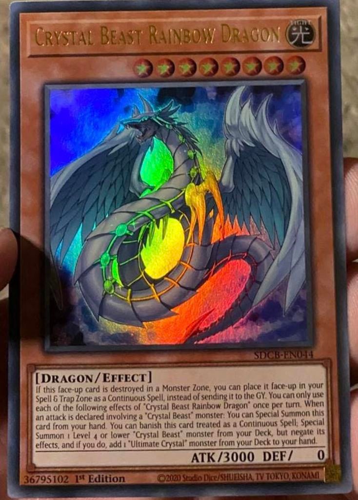 Yu-Gi-Oh! Crystal Beast Rainbow Dragon SDCB 1st Edition !, Ophalen of Verzenden, Zo goed als nieuw, Losse kaart, Foil