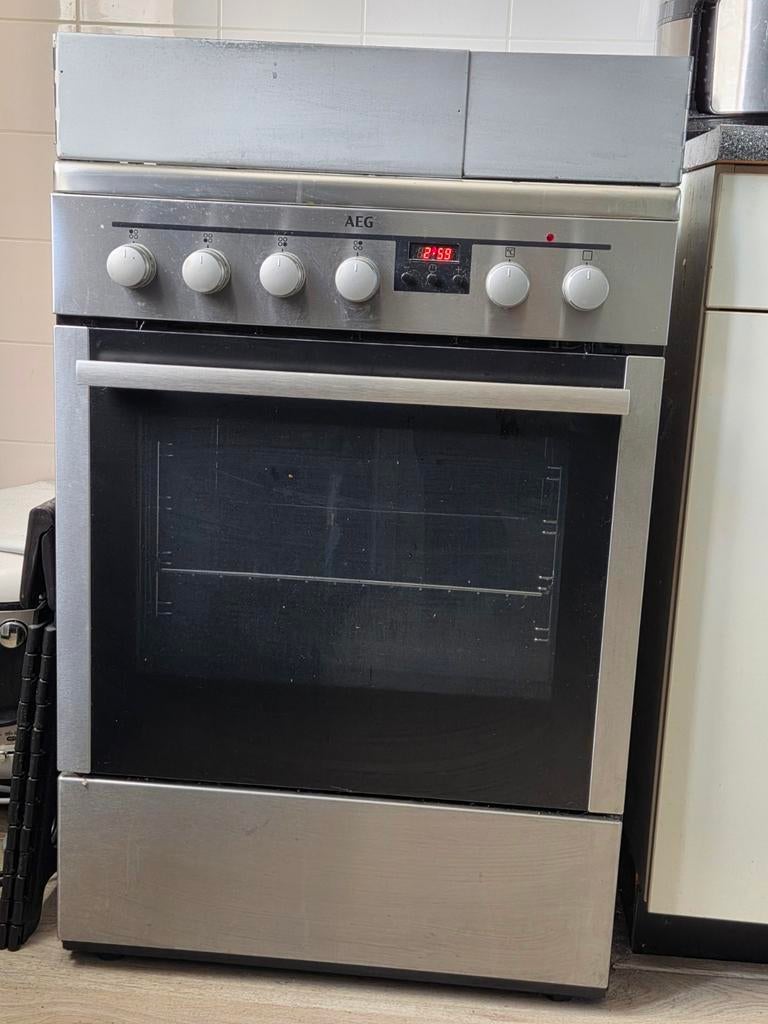 AEG Fornuis (gas) met oven, Ophalen, 4 kookzones, Gas, Vrijstaand