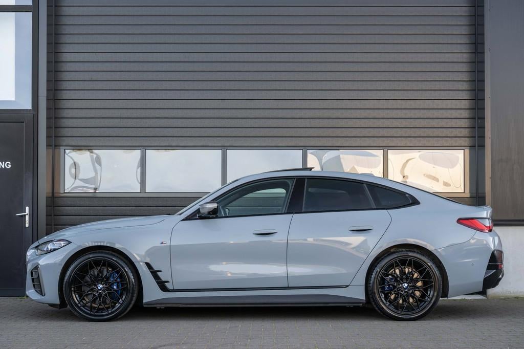 BMW I4 M50 High Executive|544 PK|PANO|LASER|Stuurverwarming, Auto's, BMW, Gebruikt, Zwart, Leder, 2190 kg