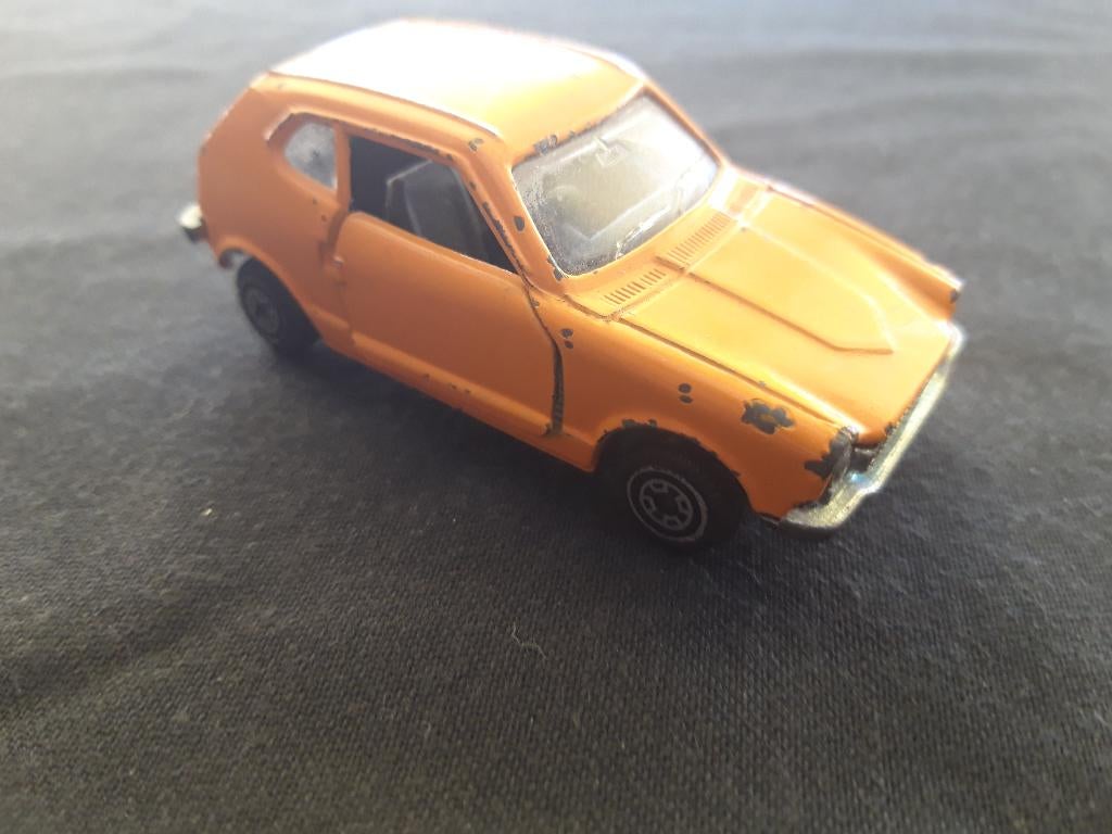 Honda Z Coupé geel 1:43 - Politoys, Ophalen of Verzenden, Gebruikt, Auto, Overige merken