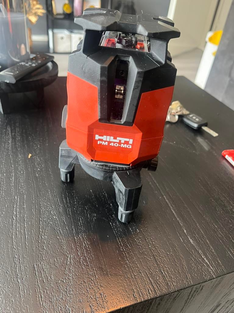 HILTI. PM 40-mg green laser + b12 55 accu Z.G.A.N, Ophalen of Verzenden, Zo goed als nieuw, Afstand
