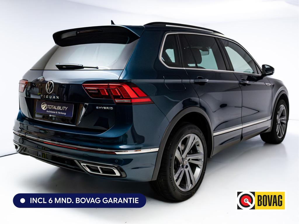 Volkswagen Tiguan 1.4 TSI eHybrid R-Line Business+ | Sfeerve, Auto's, Volkswagen, Met garantie (alle), Blauw, 59 km/l, Navigatiesysteem