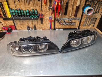 Originele hella xenon koplampen voor E39 touring en sedan  beschikbaar voor biedingen