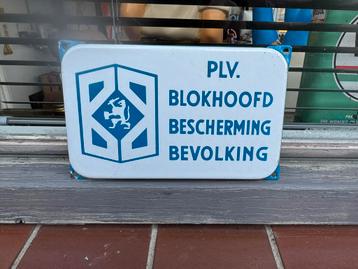 Oude PLV Blokhoofd Bescherming Bevolking Emaille Bord beschikbaar voor biedingen