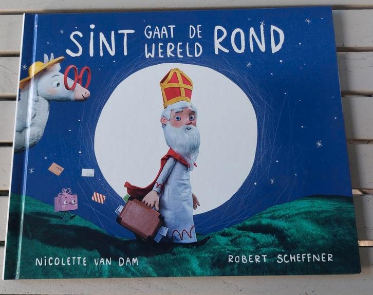 Sint gaat de wereld rond - Kinderboek, Diversen, Sinterklaas, Zo goed als nieuw, Ophalen