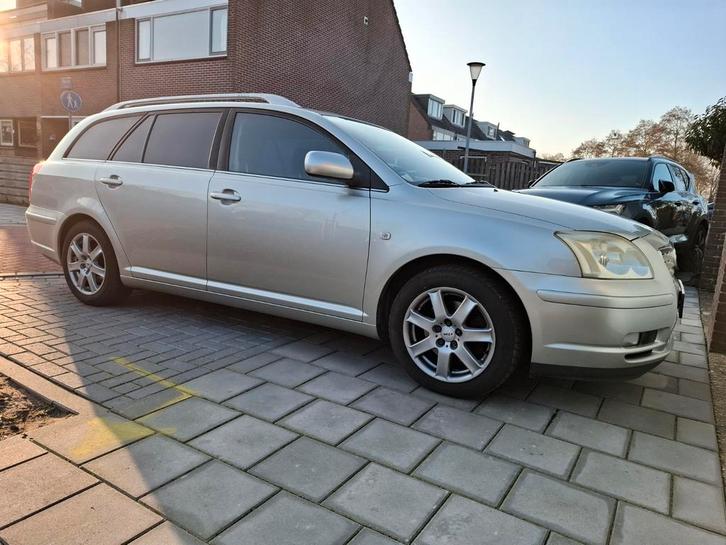Toyota Avensis 2.0 16V Automaat station 2003 Grijs, Auto's, Toyota, Particulier, Avensis, ABS, Airbags, Airconditioning, Benzine