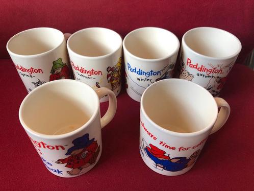 6 Mokken Paddington seizoenen plus twee andere bekers, Huis en Inrichting, Keuken | Servies, Zo goed als nieuw, Kop(pen) en/of Schotel(s)