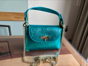 Bijentasje metallic blauw beschikbaar voor biedingen