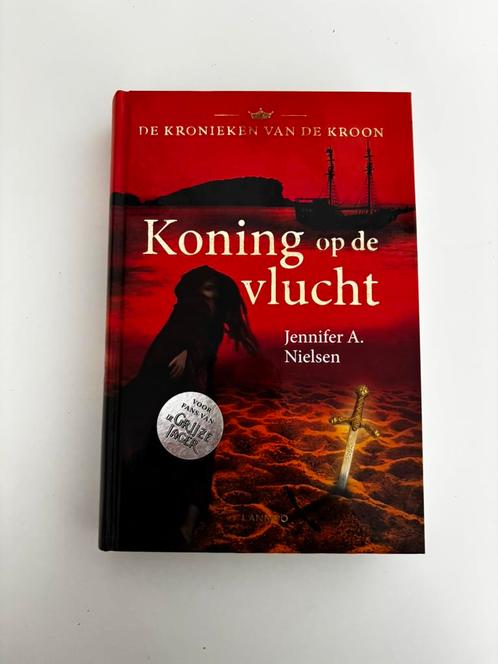 Jennifer A. Nielsen - Koning op de vlucht, Boeken, Kinderboeken | Jeugd | 10 tot 12 jaar, Zo goed als nieuw, Verzenden
