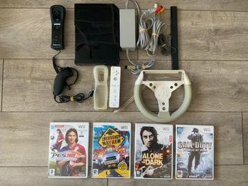 Nintendo Wii met Controllers - Nunchuck en 4 spellen te koop beschikbaar voor biedingen