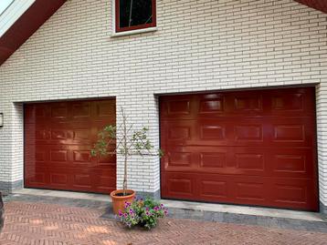 Sectionaal garagedeuren, geïsoleerd, in heel goede staat beschikbaar voor biedingen