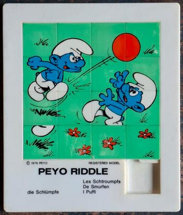 Smurfen schuifpuzzel.  PEYO RIDDLE. 1976.   17/20 cm. beschikbaar voor biedingen