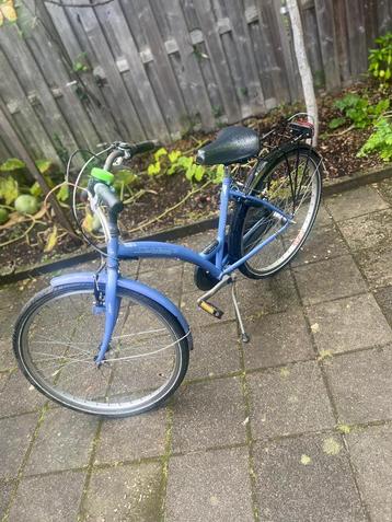 Blauwe  fiets - Gebruikt beschikbaar voor biedingen