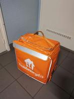 Thuisbezorgd tas en jas (maat m), Ophalen of Verzenden, Gebruikt, Oranje, 30 cm of meer