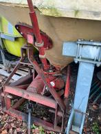 Kunstmeststrooier, Ophalen