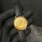 18k Omega Gouden heren horloge 1961, Ophalen of Verzenden, Zo goed als nieuw, Goud