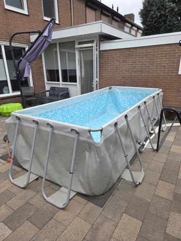 Zwembad 2x4m met Pomp en Hoes beschikbaar voor biedingen