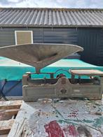 Weegschaal met diverse gewichten, Ophalen